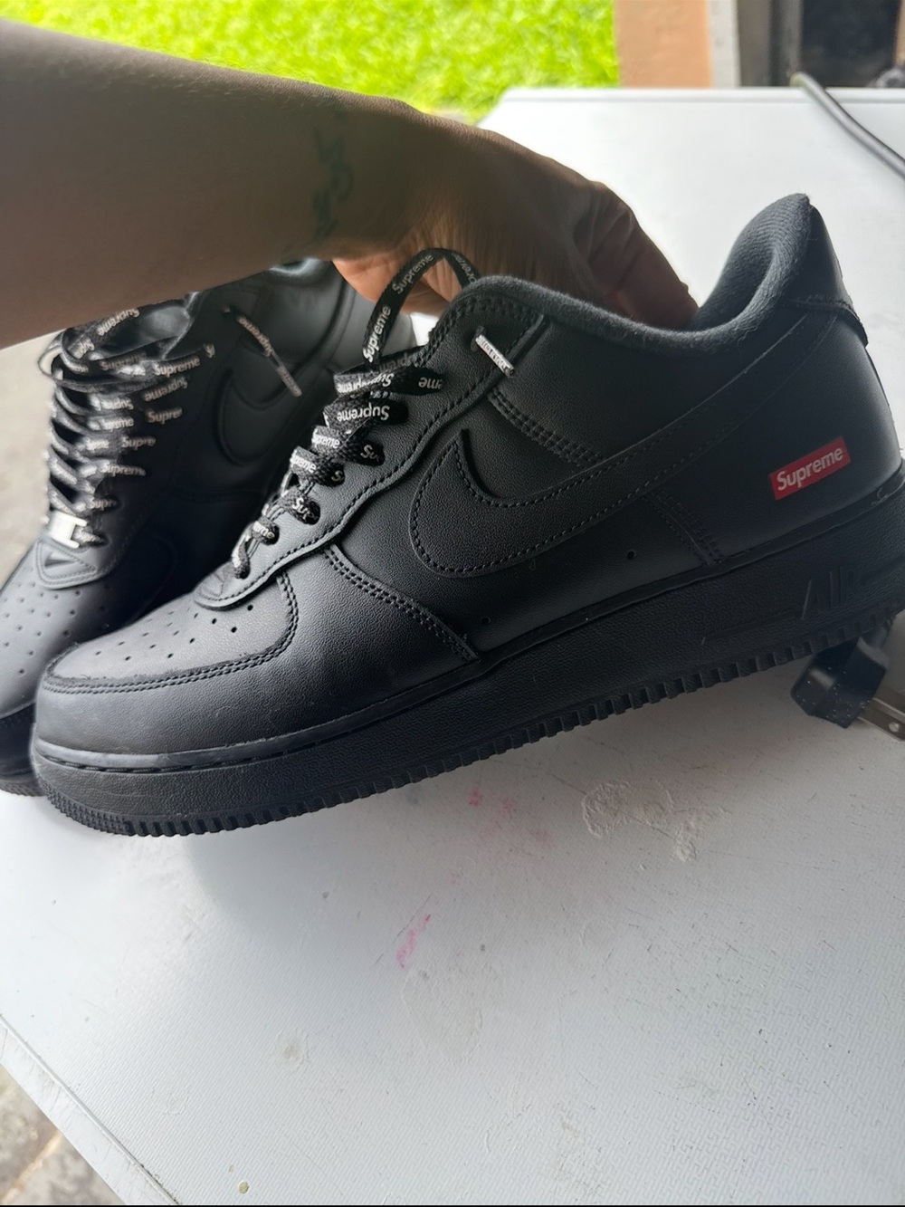 Nike Air Force 1 Low Top Sneakers in Black with Red Supreme Tag